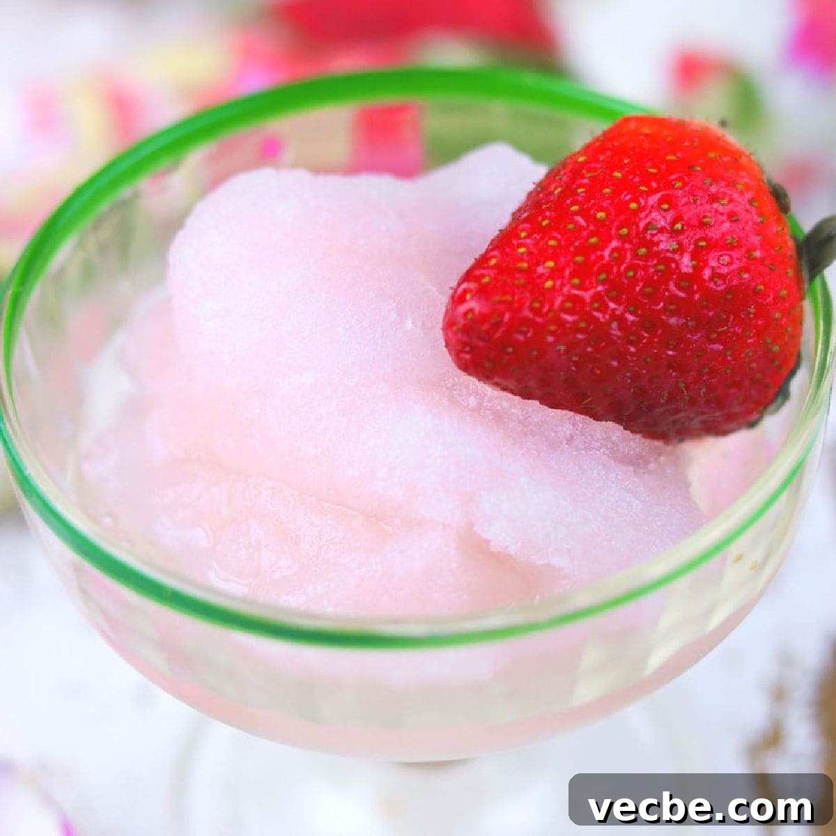 How to Make Wine Sorbet: Recipe and Tips 2 Closeup of pink rose moscato sorbet in a glass.