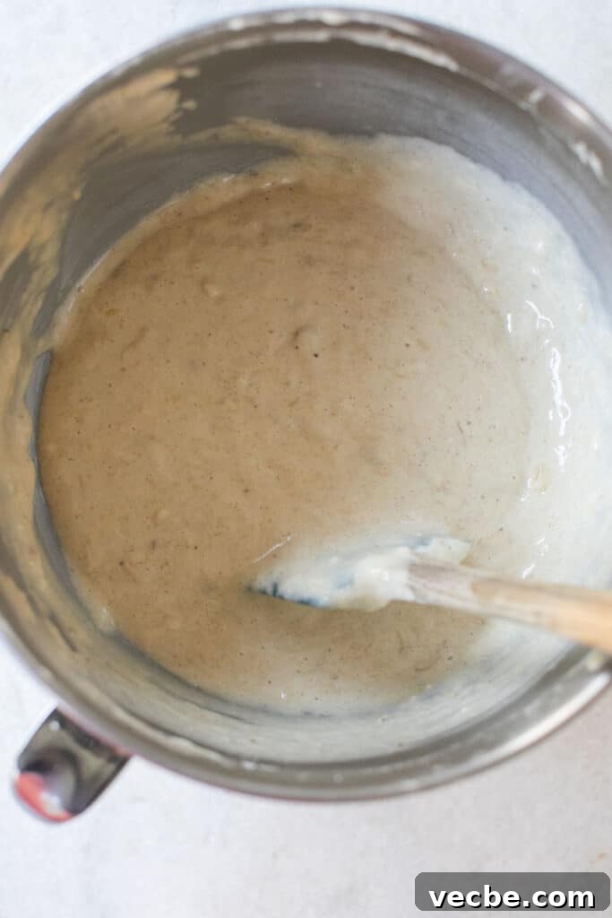 Moist Banana Bread Recipe with Ripe Bananas 9 Banana bread batter in a mixing bowl