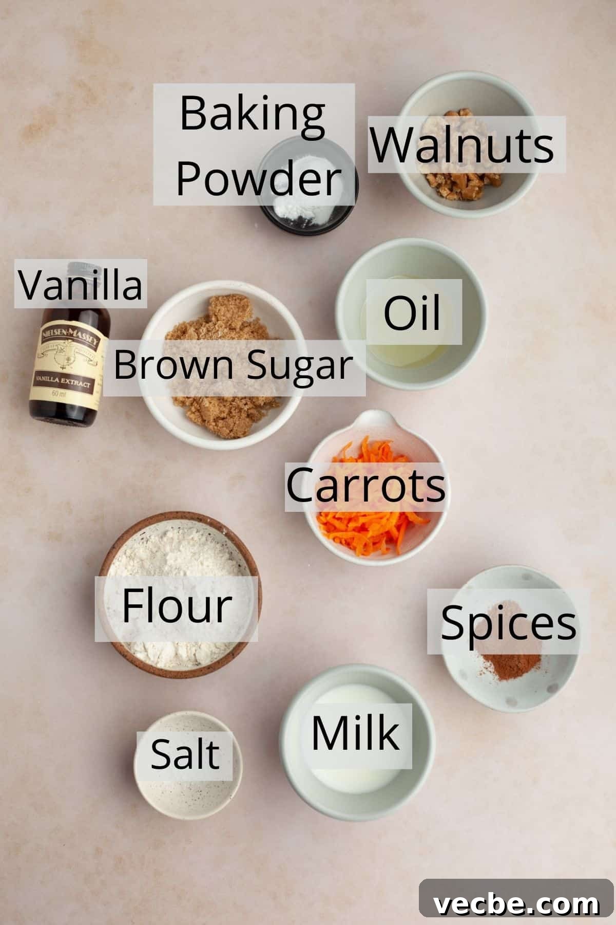 Carrot Mug Cake Recipe 3 All the ingredients for carrot mug cake weighed out in small bowls.
