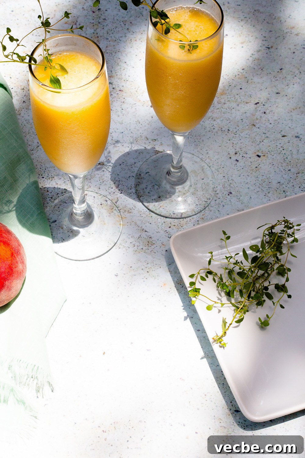 Holiday Mocktail Recipes for Festive Gatherings 7 Peach Bellini Mocktail