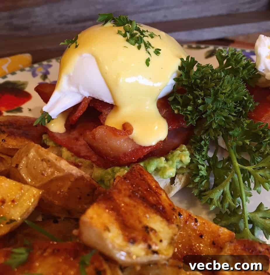Eggs Benedict Recipe: Poached Eggs and Hollandaise 2 Plate with Eggs Benedict and roasted baby potatoes
