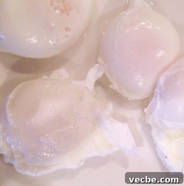 Eggs Benedict Recipe: Poached Eggs and Hollandaise 6 Four perfectly poached eggs