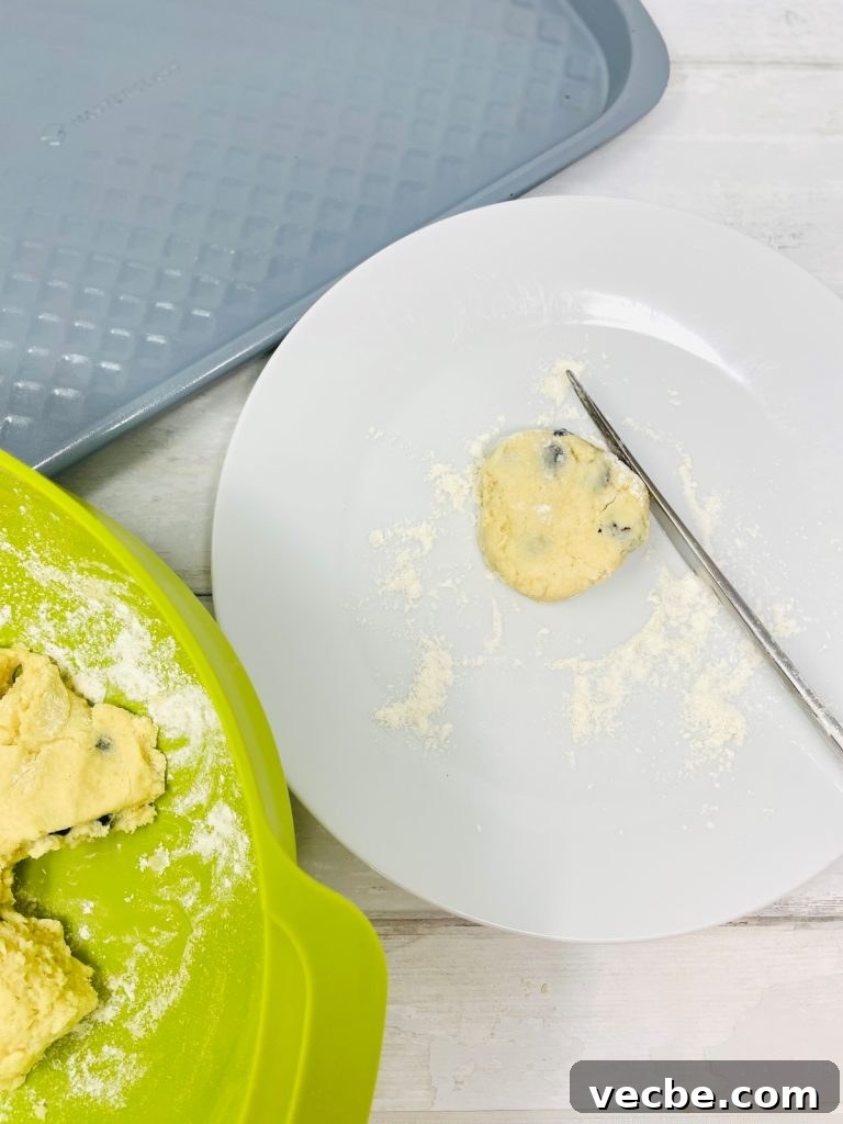 Buttery Blueberry Scones Recipe for Flaky, Tender Results 7 scone being formed into shape