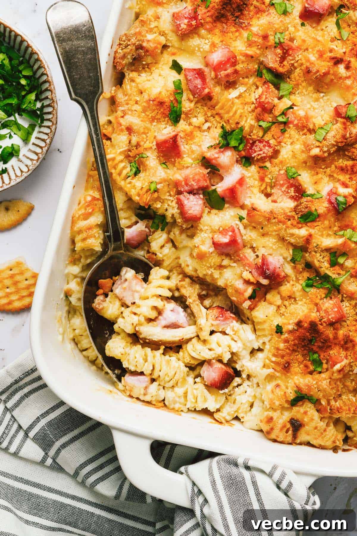 Creamy Chicken Cordon Bleu Casserole Recipe 8 A spoonful of creamy noodles in the chicken cordon bleu casserole.