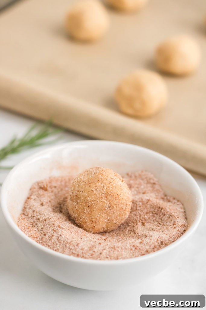 Soft Eggnog Cookies with Warm Holiday Spices 9 Scooping eggnog cookie dough.