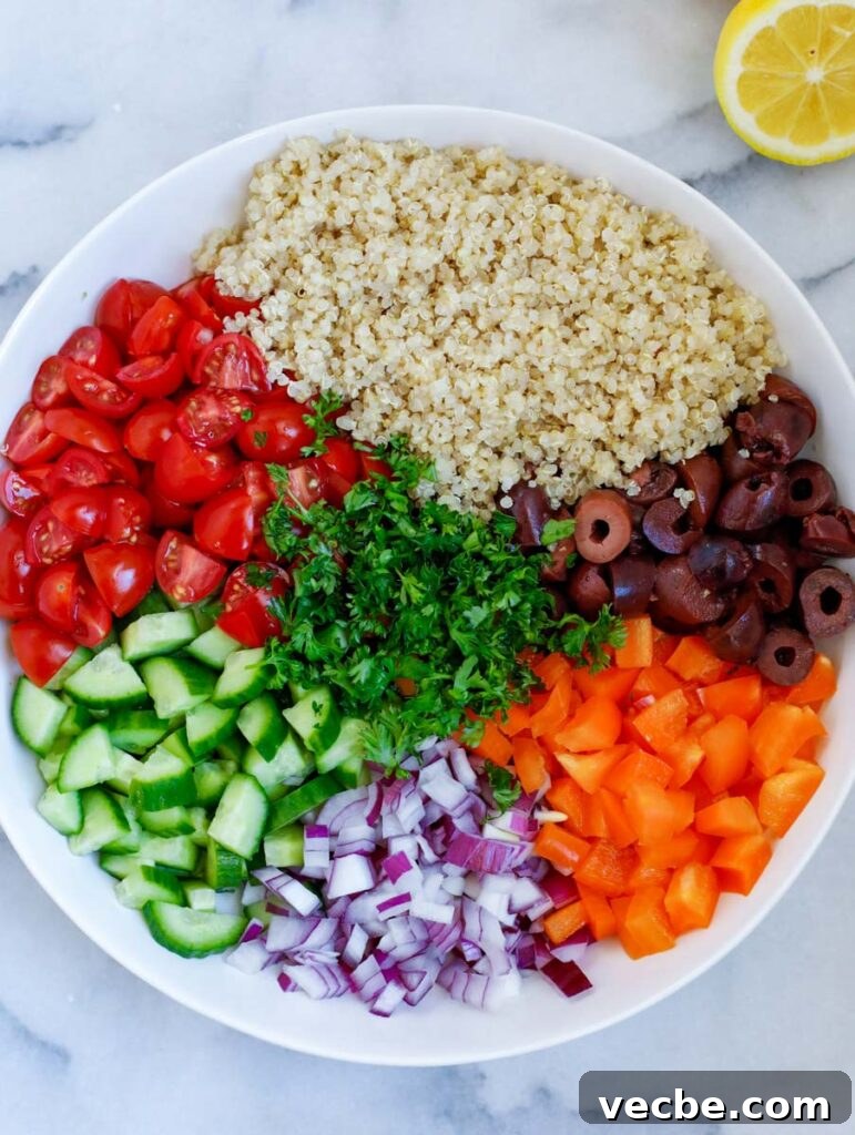 Mediterranean Quinoa Salad with Feta and Chickpeas 3 Ingredients for the salad chopped and placed on a plate