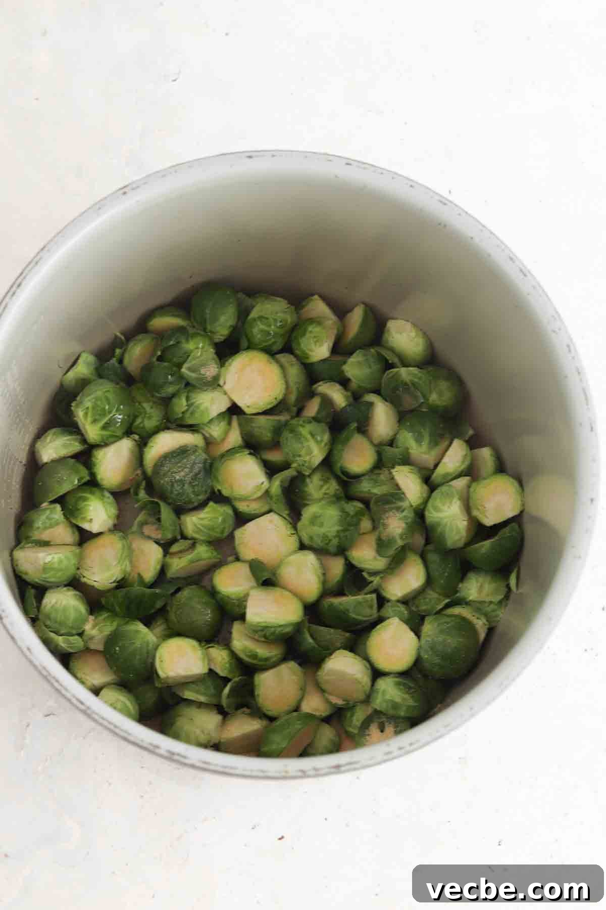 Maple Balsamic Brussels Sprouts 4 Brussel sprouts in a large air fryer.