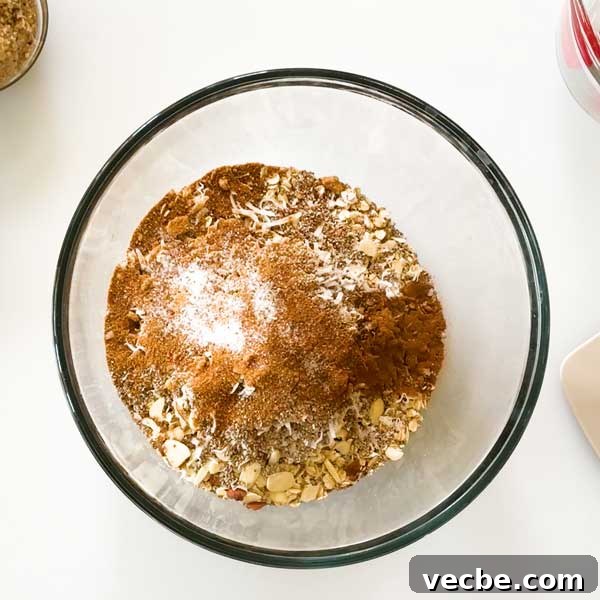 White Chocolate Vanilla Almond Granola 6 All the dry ingredients for the granola in a mixing bowl.