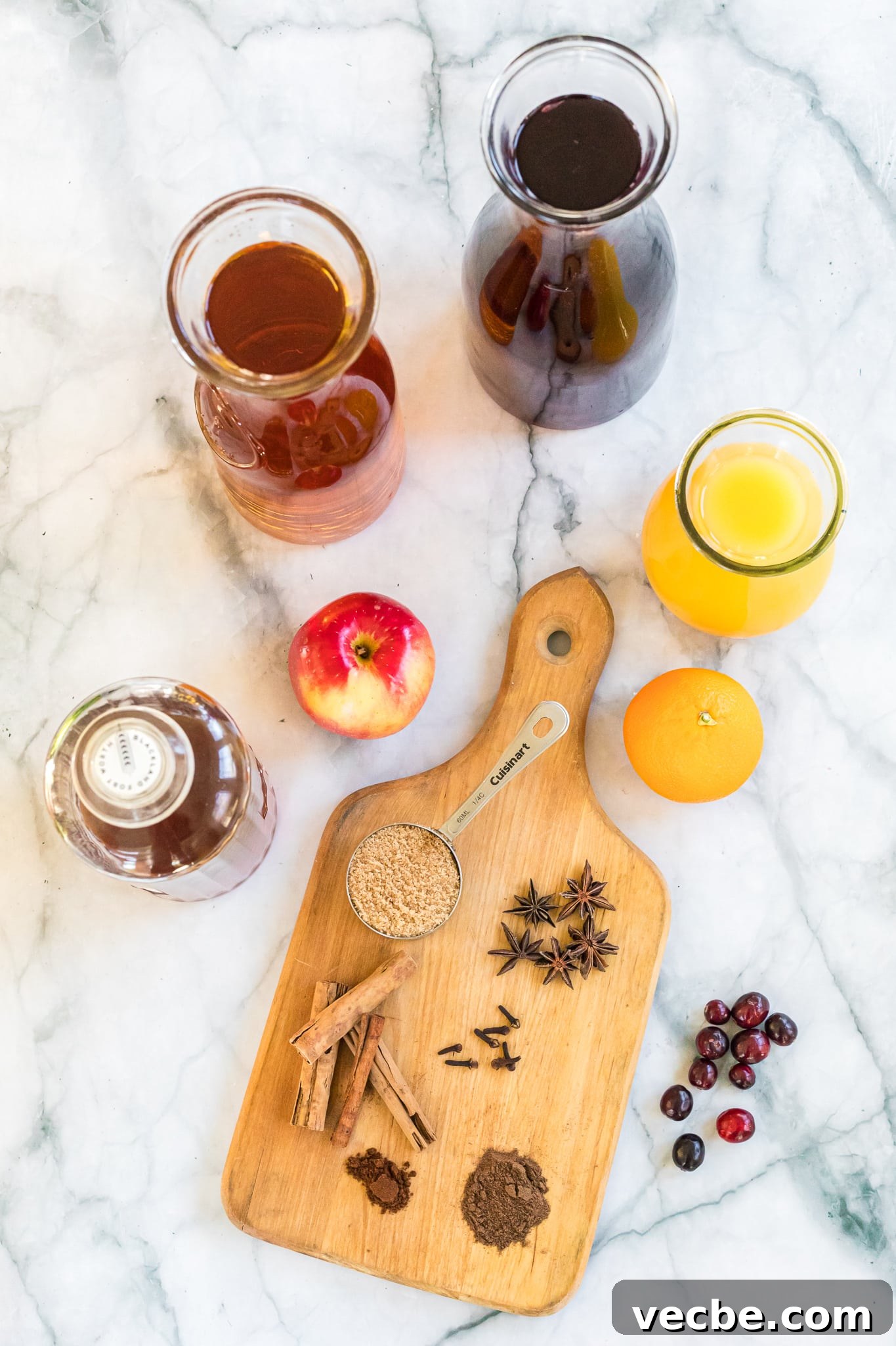 Slow Cooker Spiked Wassail: Festive Mulled Cider 4 slow cooker wassail ingredients