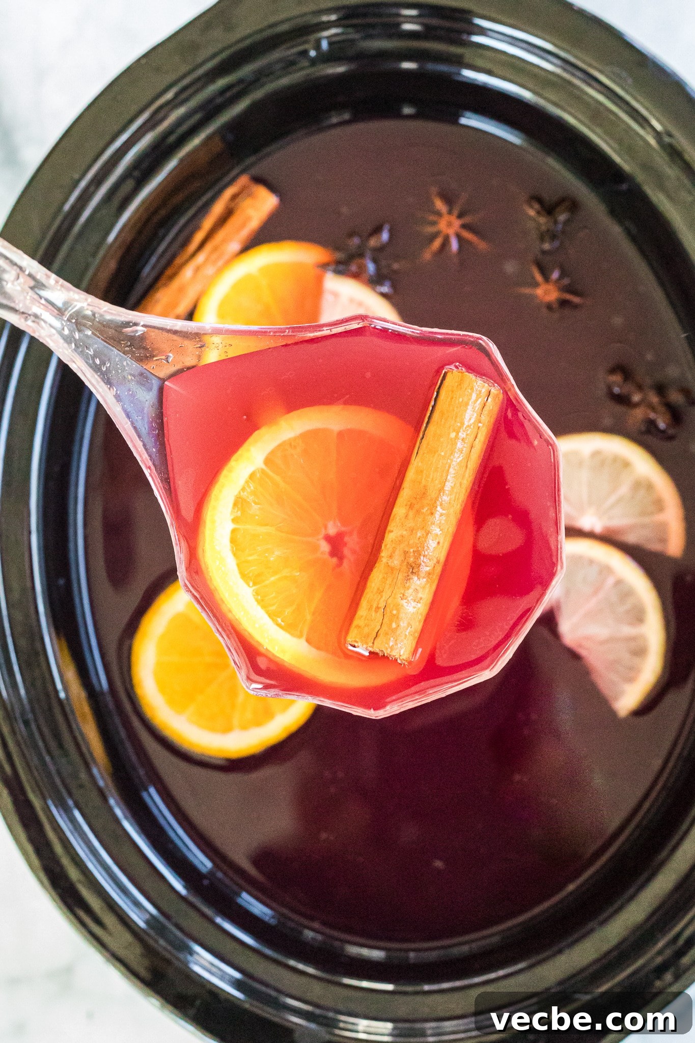 Slow Cooker Spiked Wassail: Festive Mulled Cider 7 wassail in the slow cooker