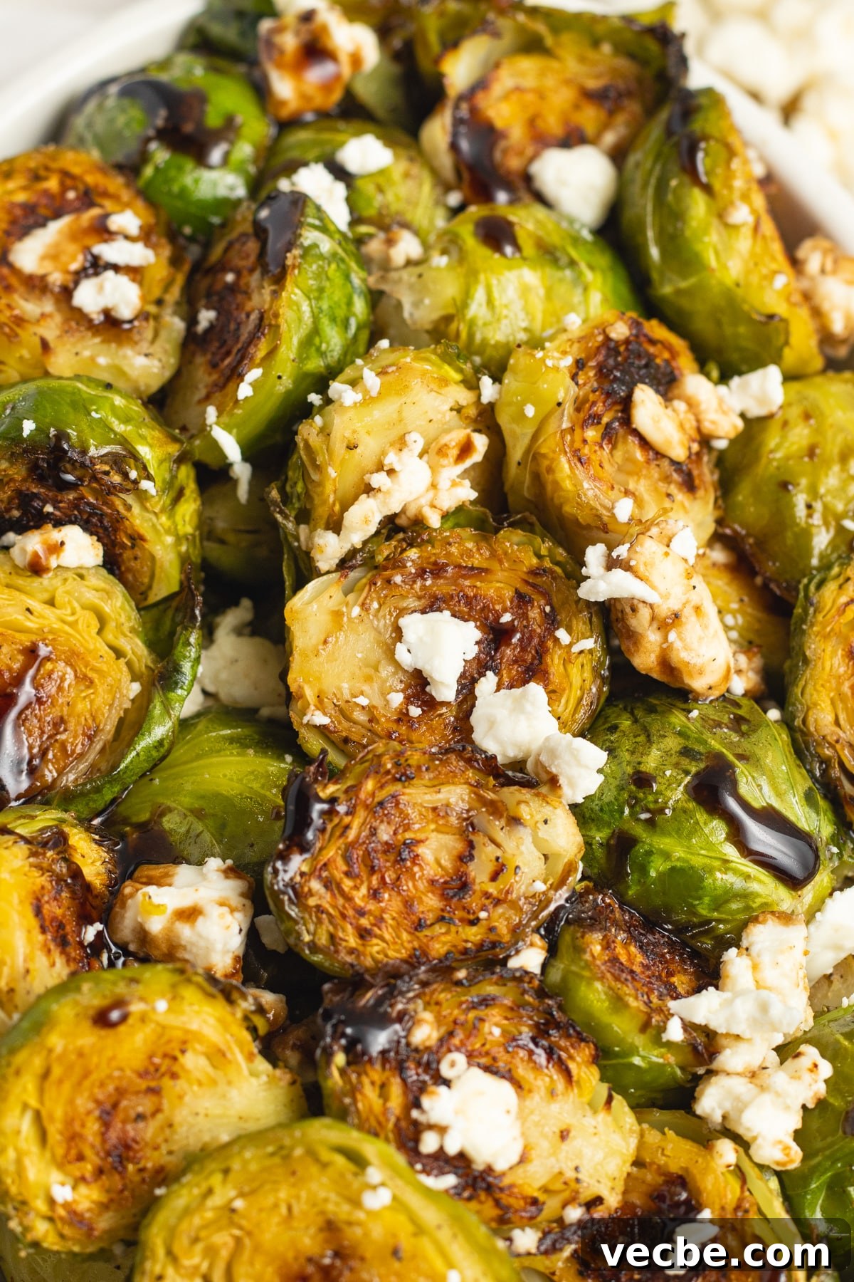 Crispy Oven-Roasted Brussels Sprouts with Feta 3 This is a close-up picture of a bowl of Brussels sprouts.