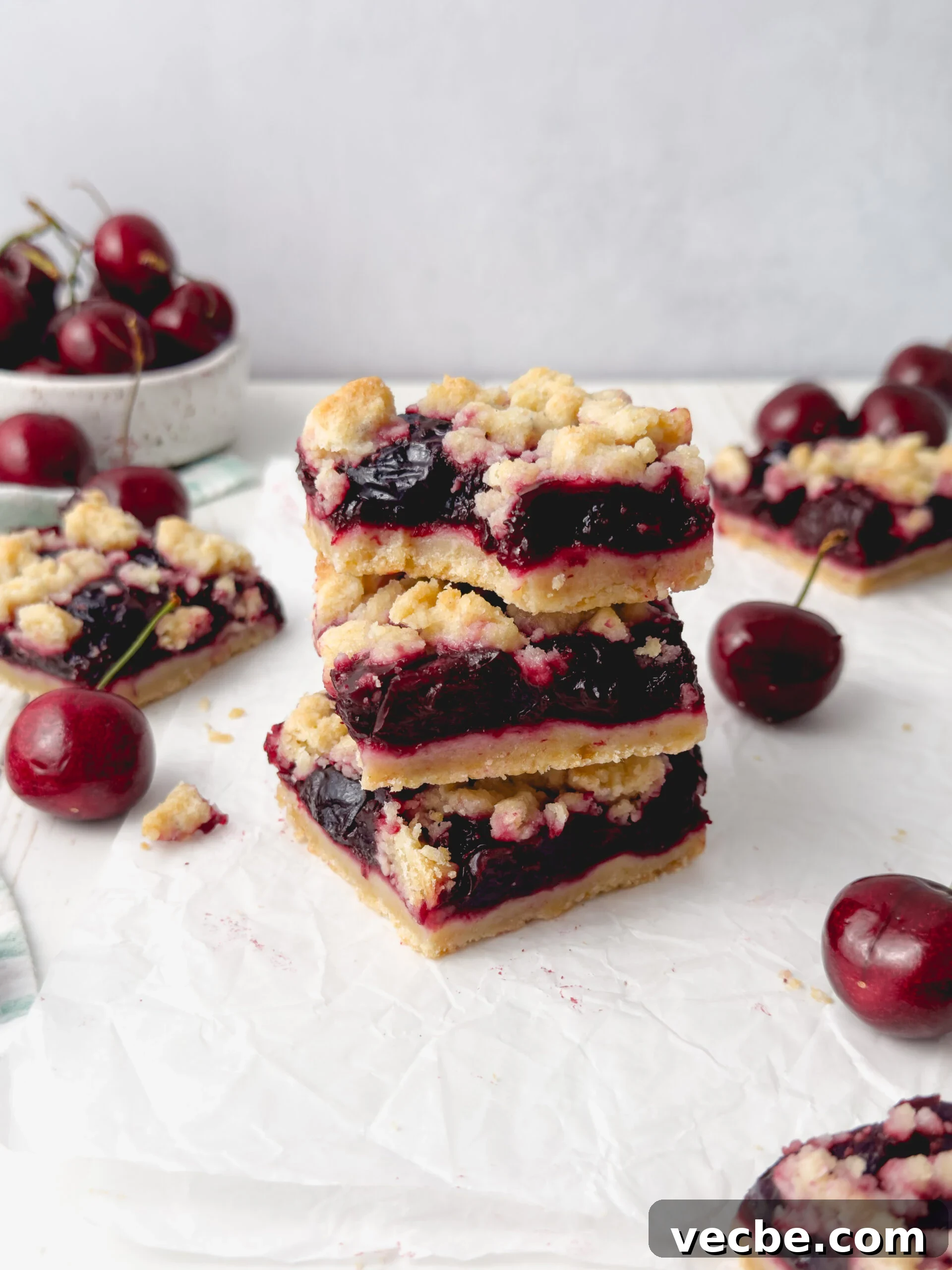 Cherry Crumb Bars with Buttery Streusel Topping 3 Stacked cherry crumb bars