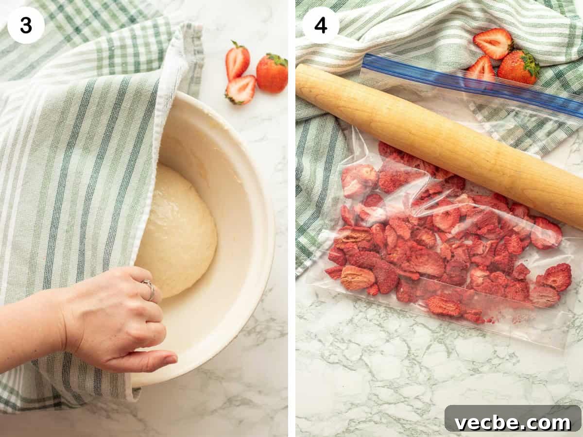Strawberry Cheesecake Cinnamon Rolls Recipe 5 Raw cinnamon roll dough in bowl with towel and clear bag with strawberries and rolling pin.