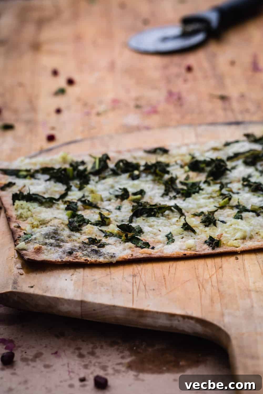 DaVero Biodynamic Winery and Farms — Estate Wines 11 A pizza just out of the outdoor pizza oven, ready to be cut up.