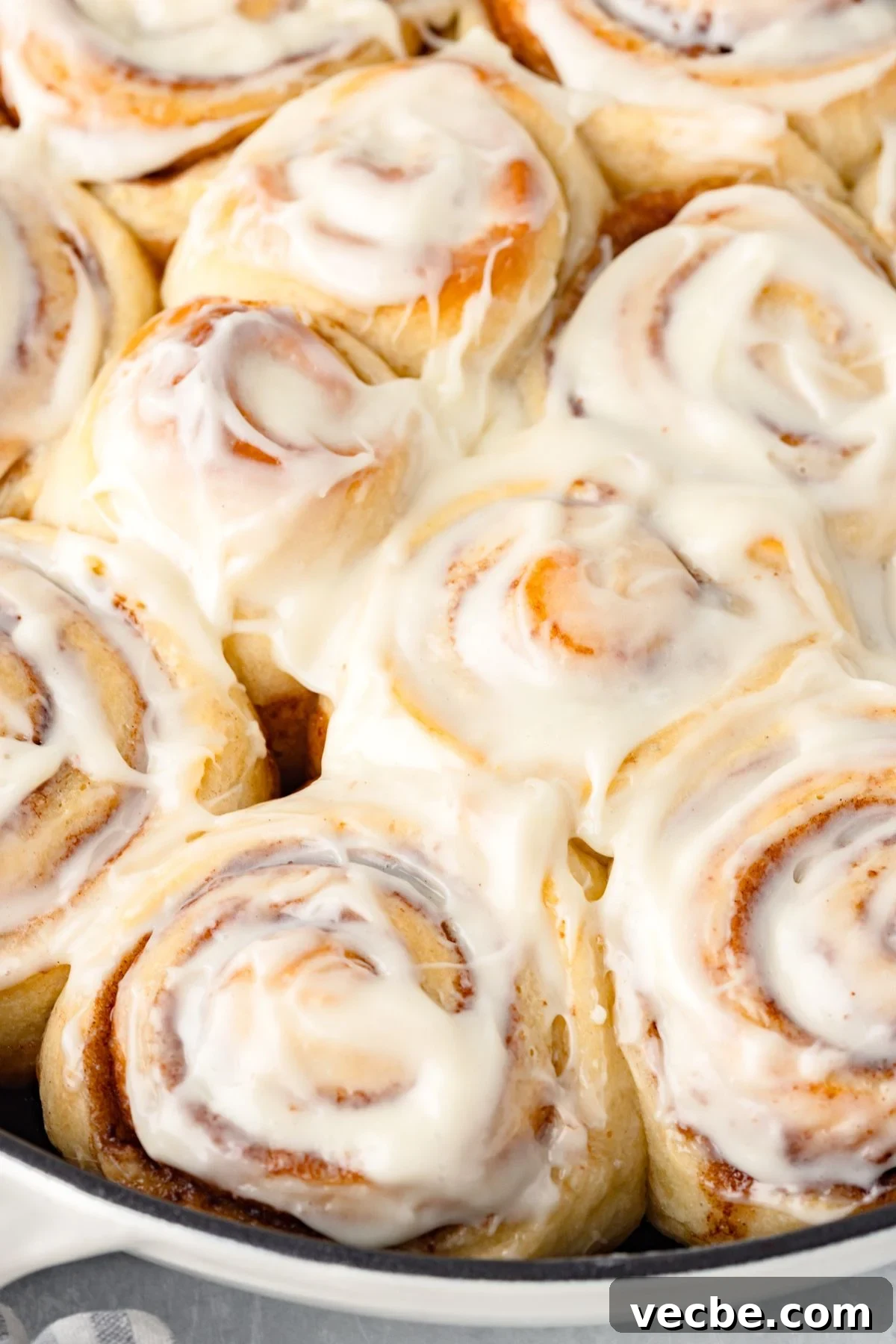 Sourdough Discard Cinnamon Rolls Recipe 2 Close-up image of Sourdough Discard Cinnamon Rolls topped with cream cheese frosting.