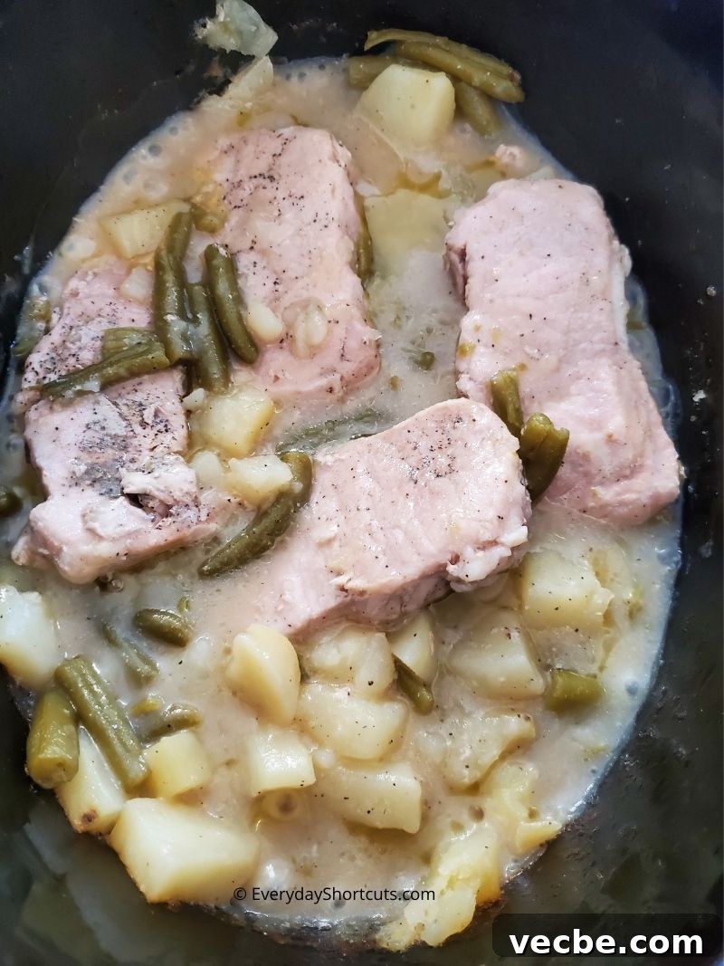 Slow Cooker Pork Chops with Potatoes and Green Beans 8 Adding potatoes and green beans to slow cooker pork chops