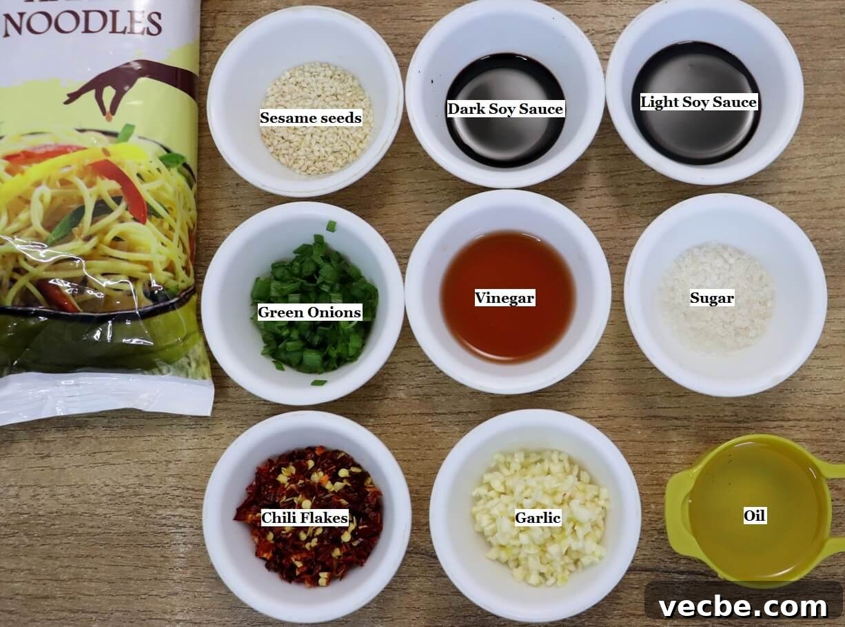15-Minute Garlic Chili Oil Noodles Recipe 3 individually labeled ingredients to make garlic chili oil noodles recipe are laid out on a table.