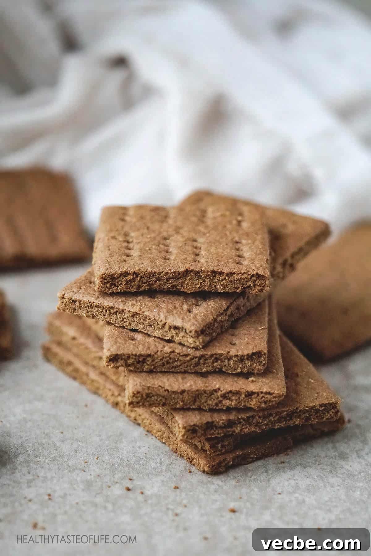 Gluten Free Vegan Graham Crackers Recipe 2 Healthier homemade gluten-free vegan graham crackers stacked showing close-up texture.