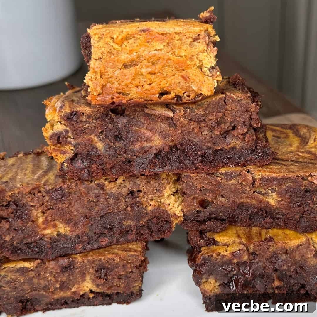 Fudgy Pumpkin Cheesecake Brownies Recipe 3 Fudgy pumpkin cheesecake brownies cut into squares