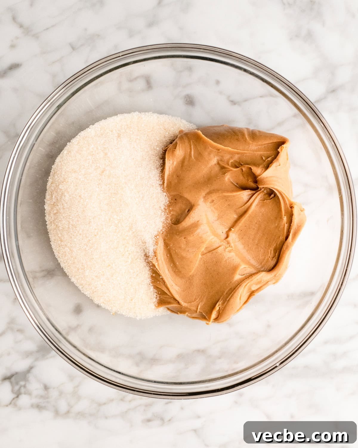 Gluten Free Peanut Butter Blossoms Recipe 4 peanut butter and sugar in a bowl before mixing