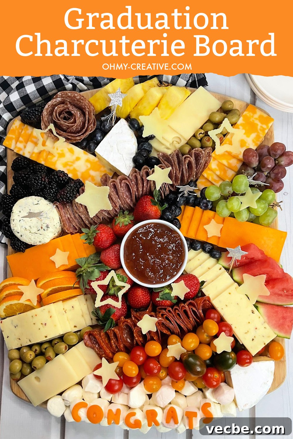 Graduation Charcuterie Board Ideas for Your Party 5 The ultimate graduation party foods - graduation party charcuterie board with the congrats made out of cheeses and jams and dips.