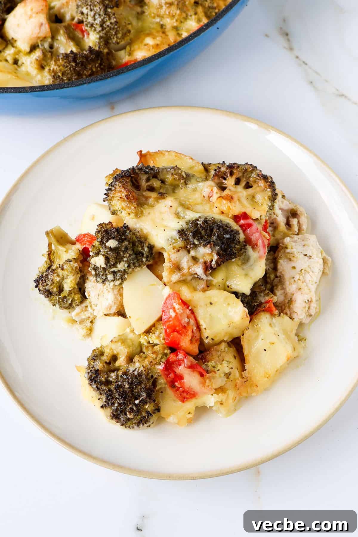 Creamy Baked Chicken, Broccoli and Potato Casserole 8 Side shot of the chicken casserole on a plate.