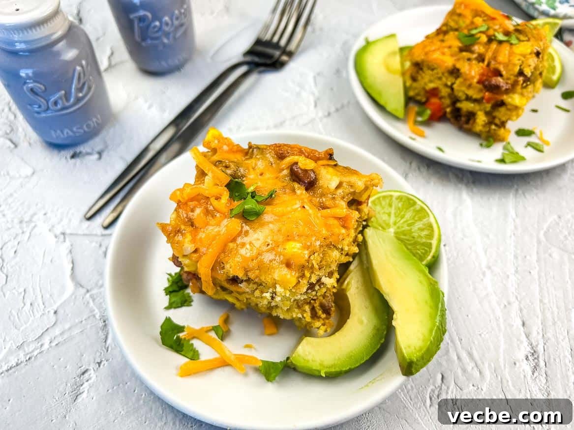 25 Ground Beef Recipes for Real Weeknight Dinners 2 Two servings of Cowboy Cornbread Casserole on plates.