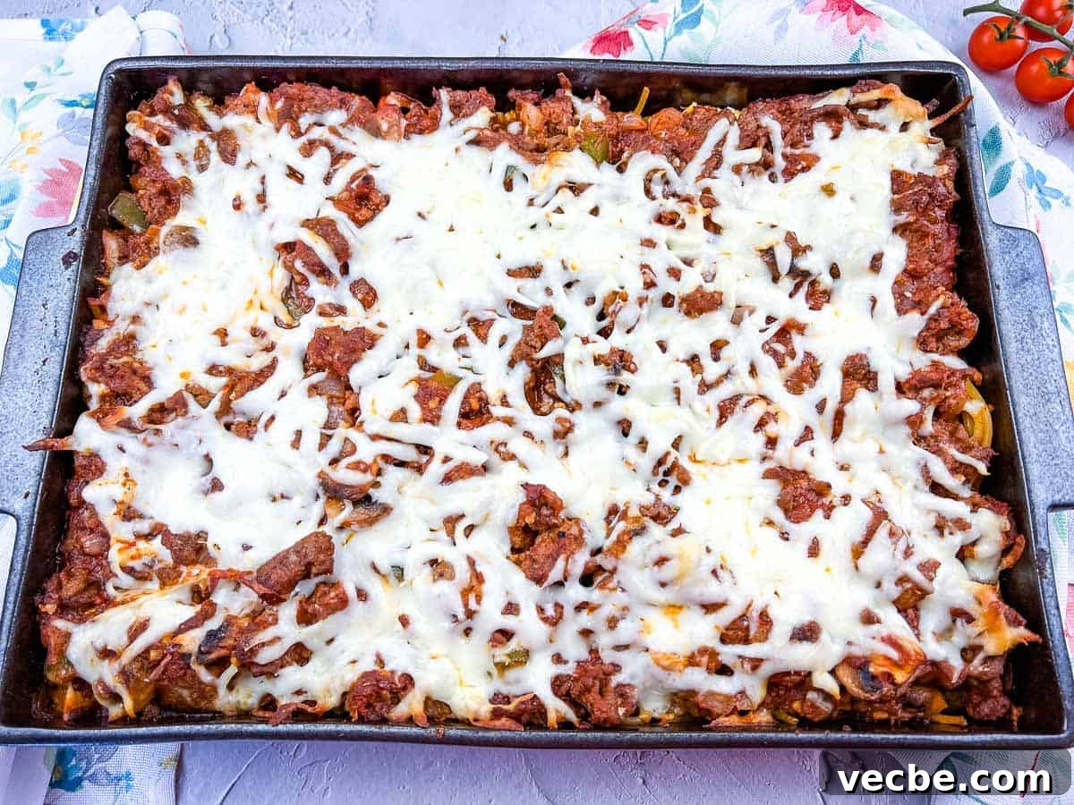 25 Ground Beef Recipes for Real Weeknight Dinners 17 Spaghetti with meat and cheese in a baking dish.