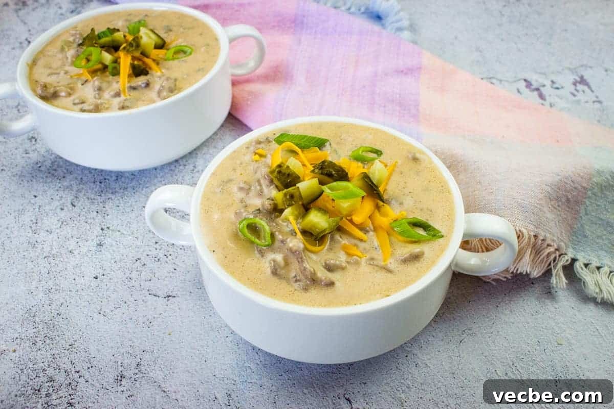 25 Ground Beef Recipes for Real Weeknight Dinners 19 Cheeseburger soup in two serving bowls.