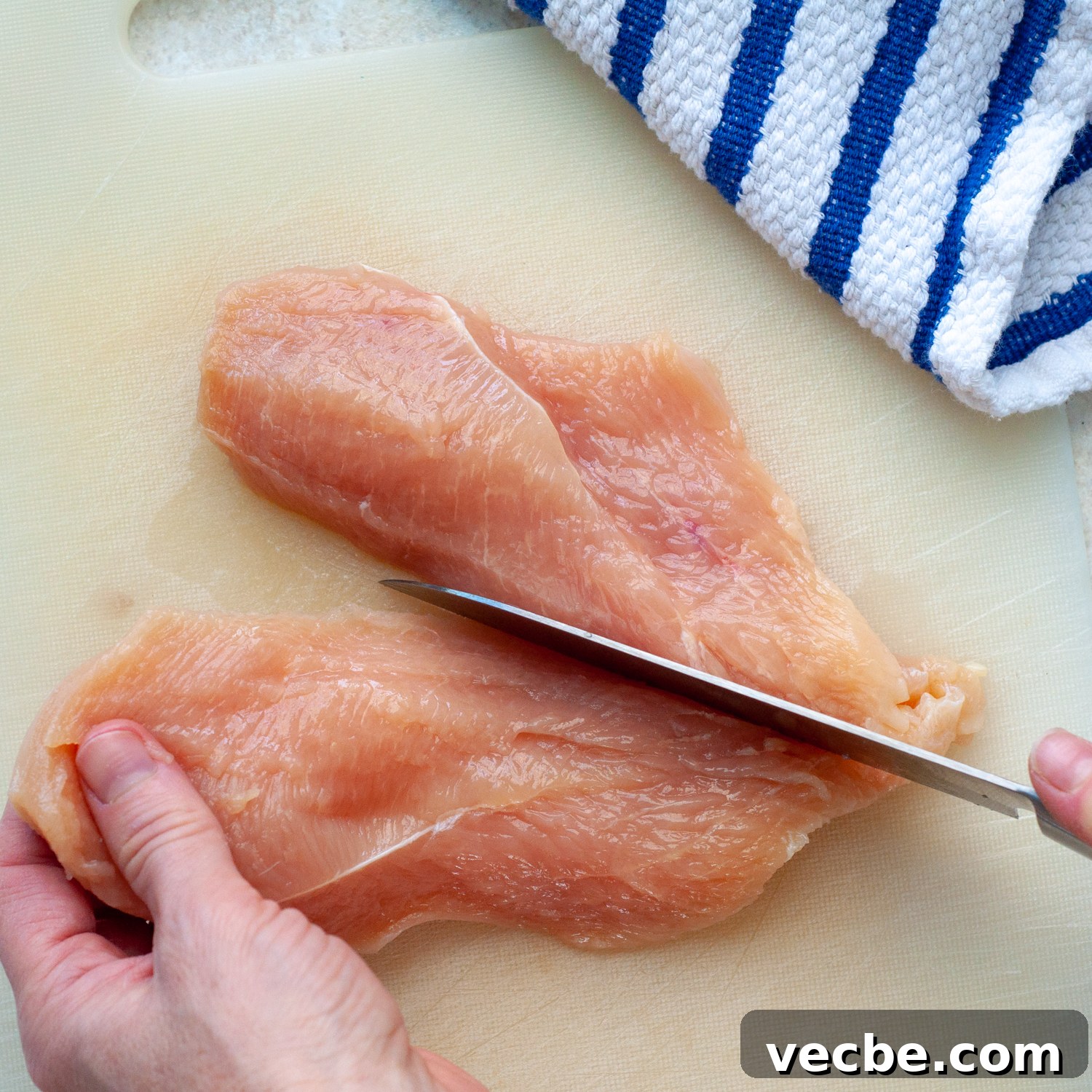 Buffalo Chicken Bake with Tortilla Chip Crust 4 cutting the butterflied chicken breast into 2 cutlets.