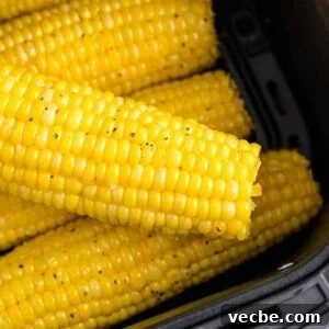 Crispy Buttered Air Fryer Corn on the Cob 14 Air fryer corn on the cob in the air fryer.