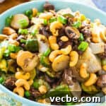 Keto Cashew Beef Stir-Fry 5 Keto Cashew Beef in a light blue bowl.