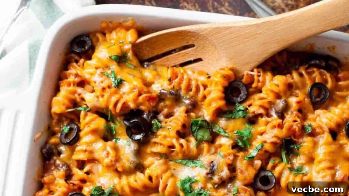 11 Comfort Foods That Will Make You Abandon Your Diet 7 Mexican Pasta Bake in a casserole dish.
