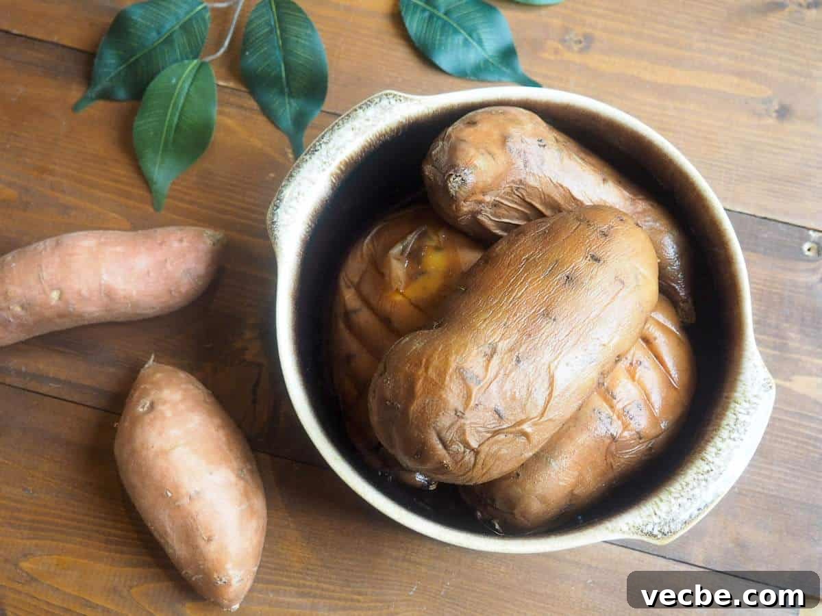 How to Cook Sweet Potatoes in the Instant Pot 5 A brown bowl of cooked Instant Pot sweet potatoes.