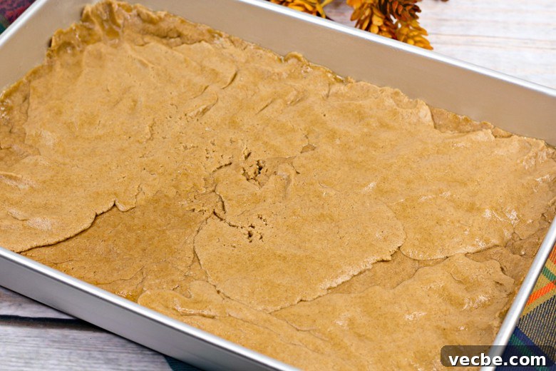 Autumn Harvest Spice Bars with Maple and Cinnamon 5 harvest spice bars dough in pan