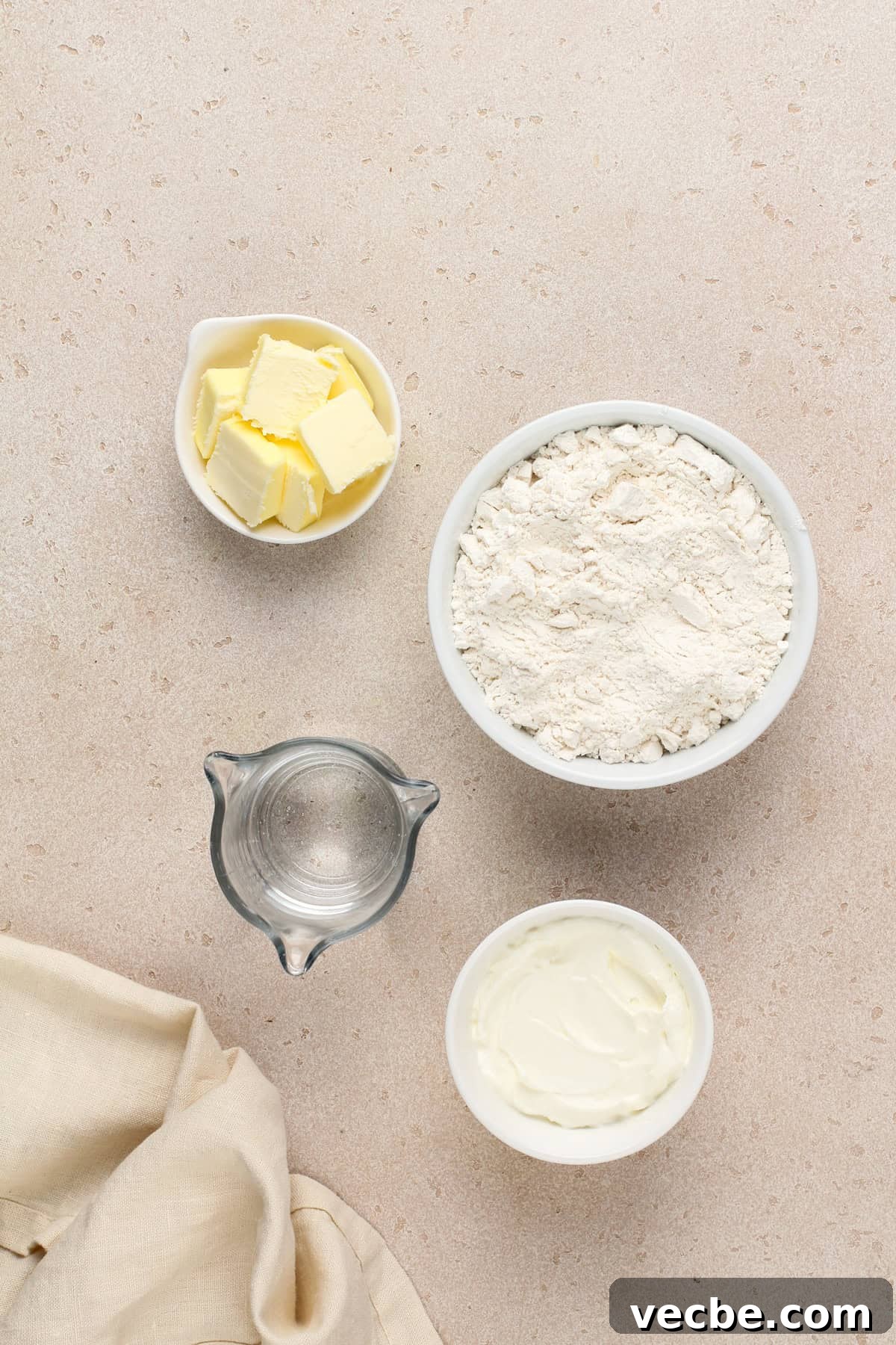Fluffy 7-Up Biscuits Recipe 5 Ingredients for 7up biscuits on a beige countertop.
